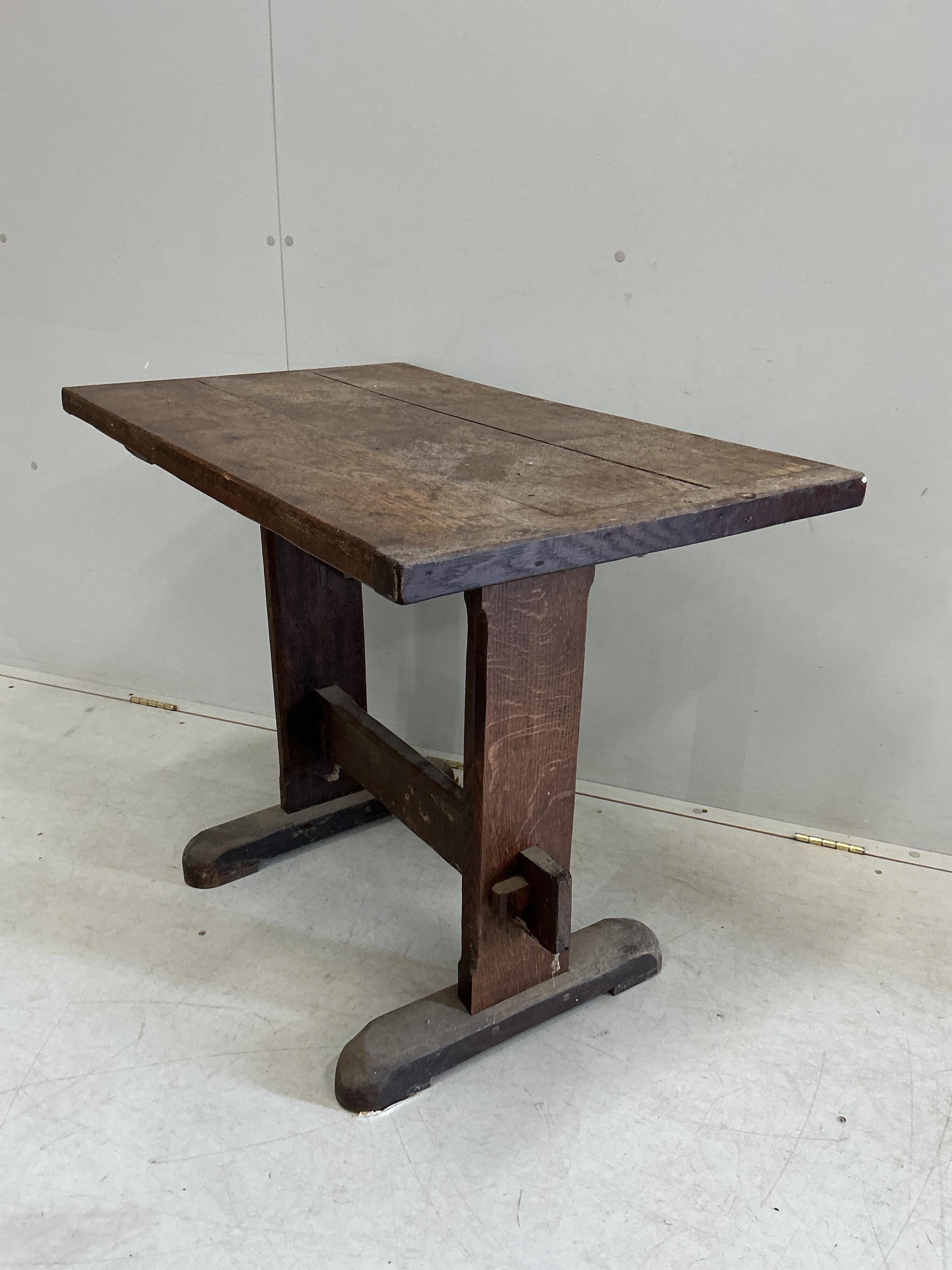 A rectangular oak side table, width 92cm, depth 55cm, height 73cm